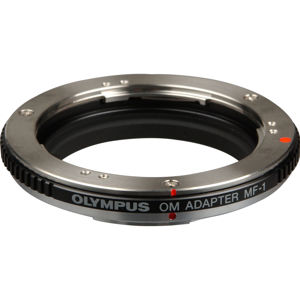  Olympus MF-1 Lens Adapter, Permits the Adaption of Certain OM Mount Lenses to be used with the Four Thirds mount Digital Cameras. 
