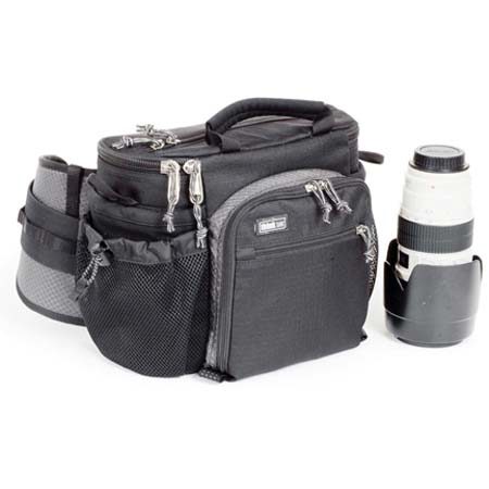 Think Tank Speed Freak, Beltpack for SLRs with a Lens Attached and a 80-200mm f/2.8 Next to It. image