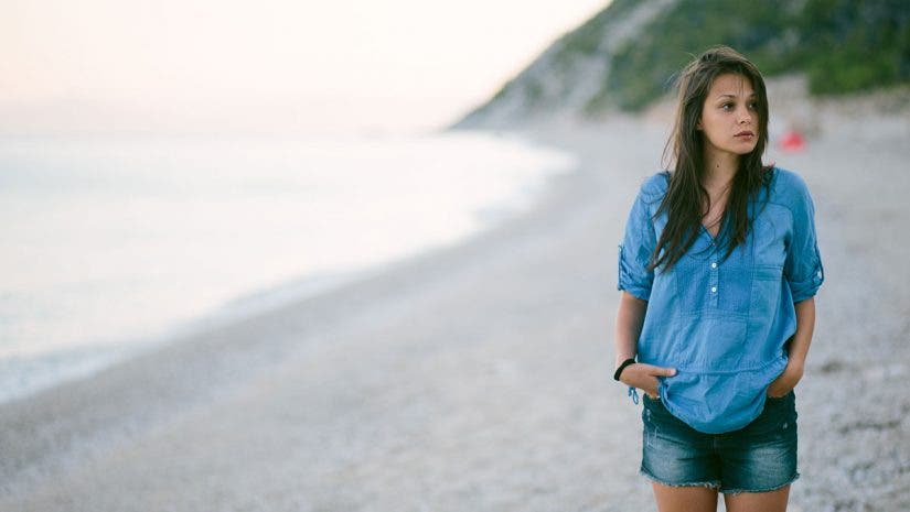girl walking on the beach