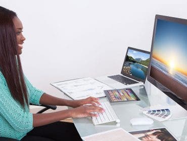woman photo editor working computer monitor