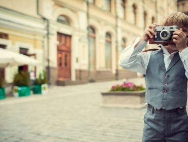 little boy with a camera