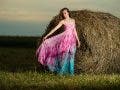 girl teen pink dress hay bale farm