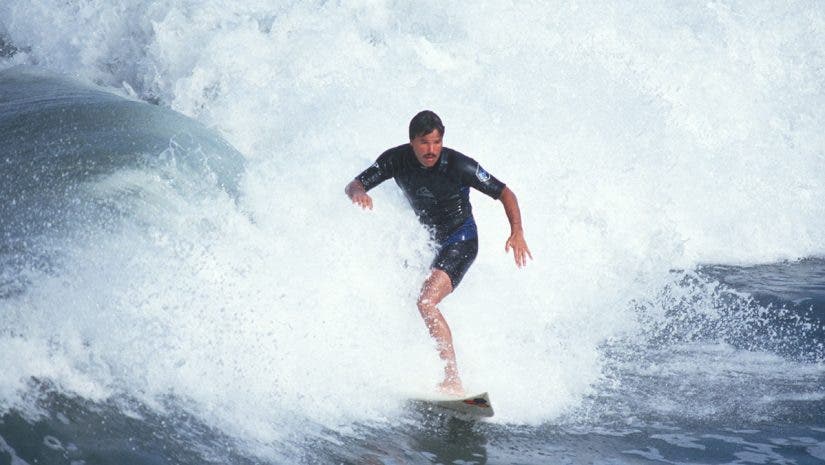 man surfing the waves