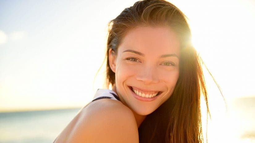 asian woman beach sunset