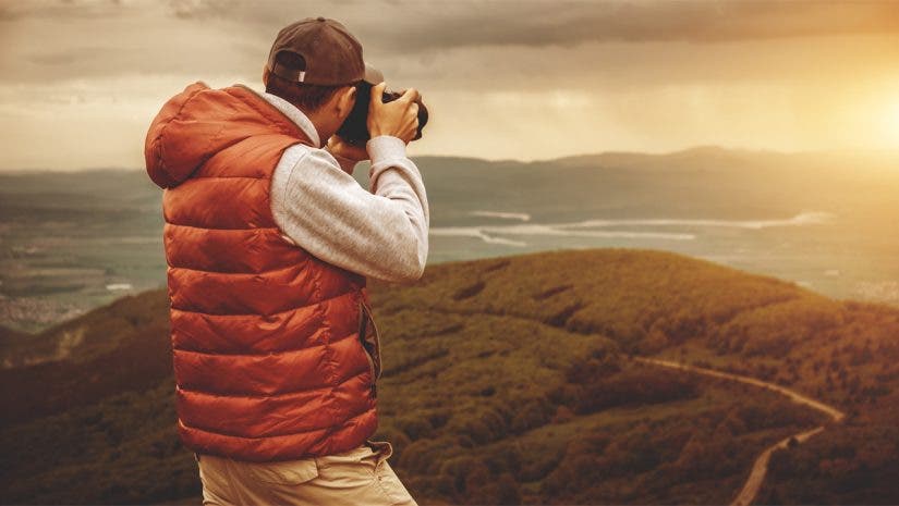 photographer with sunset