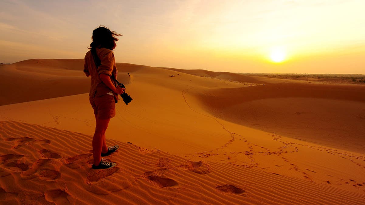 photographer in desert