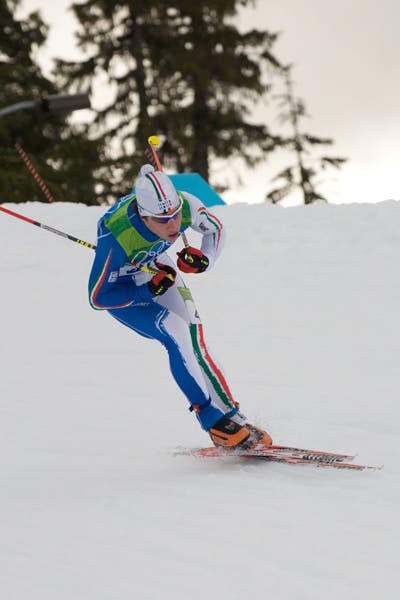 man skiing down on snow hill