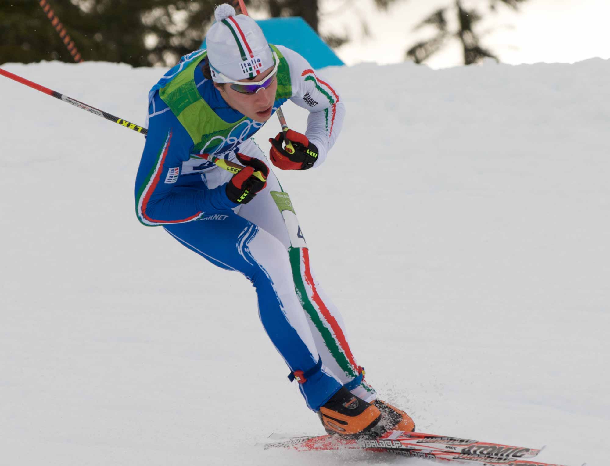 man skiing down on snow hill