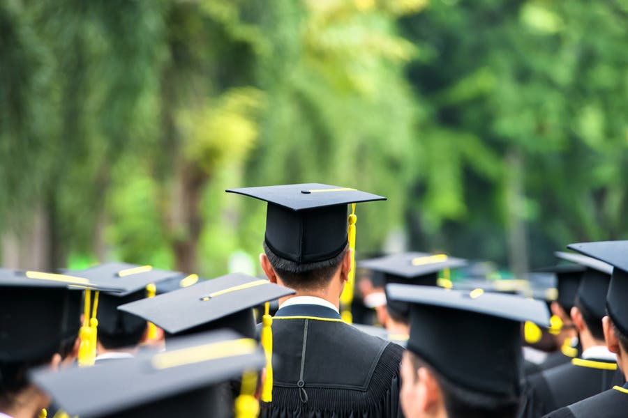 Back of graduates during commencement