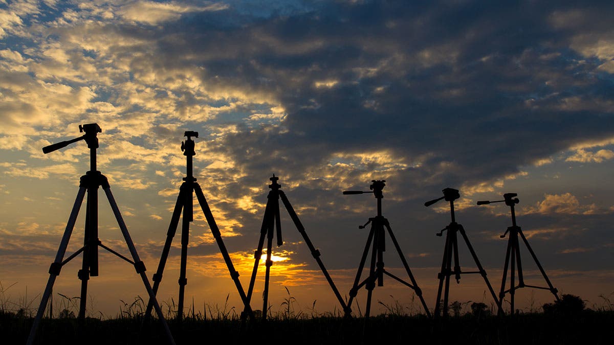 tripods sunset
