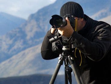 photographer tripod dslr camera