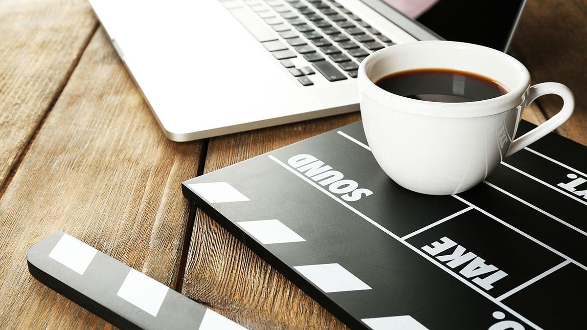 laptop coffee cup movie clapper