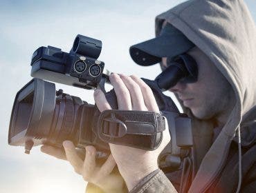 videographer holding camcorder
