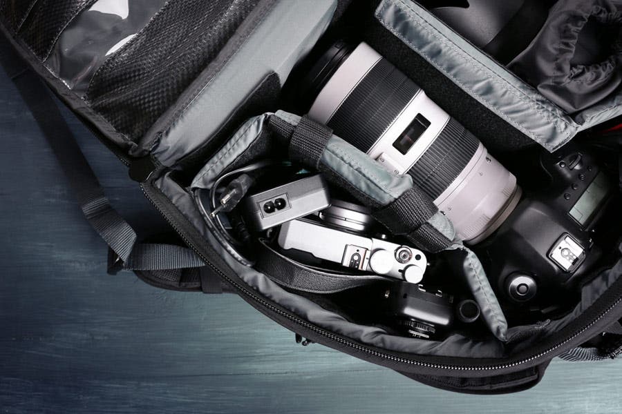 Photographer's equipment on a dark blue background