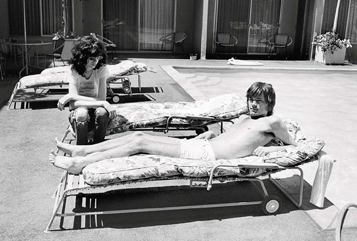 Joey and Dee Dee Ramone lounging out by the pool. Hollywood, California, 1977. Photo courtesy of Danny Fields.
