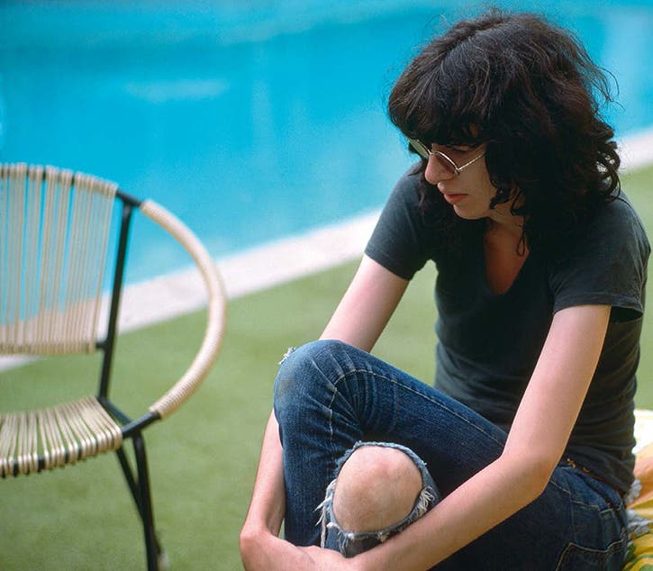 Joey Ramone sitting by the pool at Sunset Marquis, Los Angeles. Photo courtesy of Danny Fields.