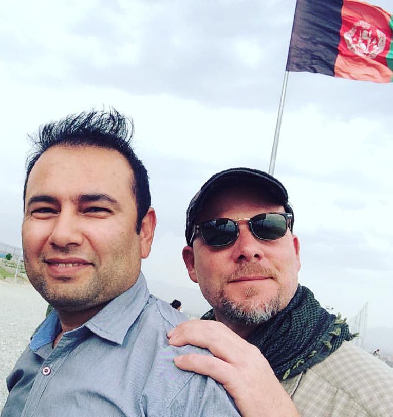 Zabihullah Tamanna (left) and David Gilkey in Afghanistan on June 2. (Photo credit: Monika Evstatieva/NPR)