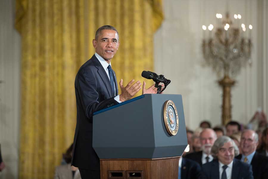 White House photograph of President Obama speaking at the podium