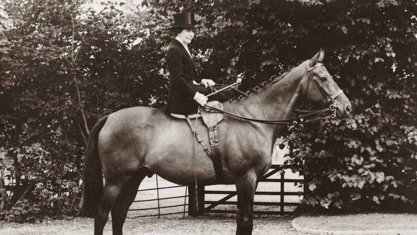 old photo of a woman riding a horse