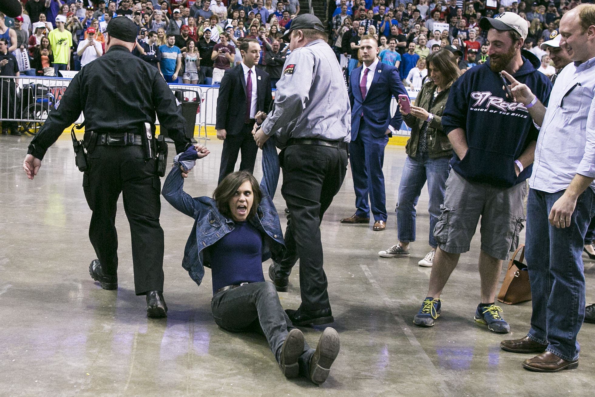 UNITED STATES - APRIL 18 - Protestors are removed by law enforcement and security as Republican presidential candidate Donald Trump speaks at a campaign rally at the First Niagara Center, in Buffalo, N.Y., Monday, April 19, 2016. Trump has focused his campaign on the New York Primary, which is Tuesday, April 19, 2016. (Photo By Al Drago/CQ Roll Call)