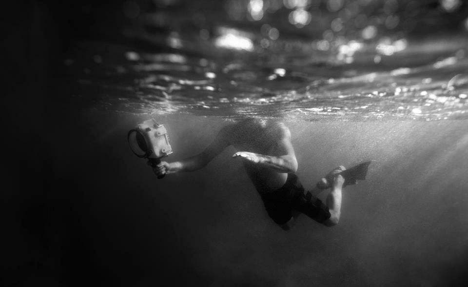 photographer dylan gordon shooting surf photography underwater