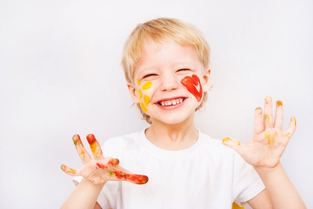 portrait of a child with face paint