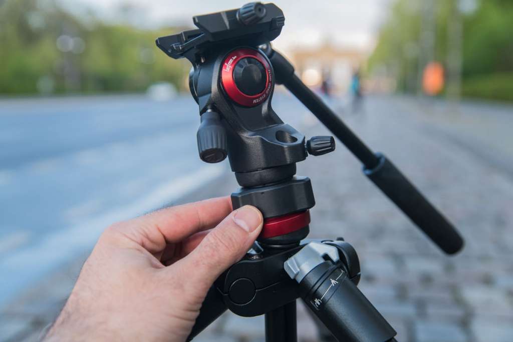 lightweight travel tripod head swivel to the left