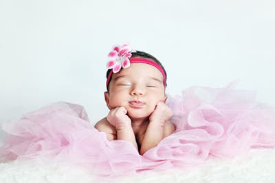 Baby Photo Sleeping On Elbows