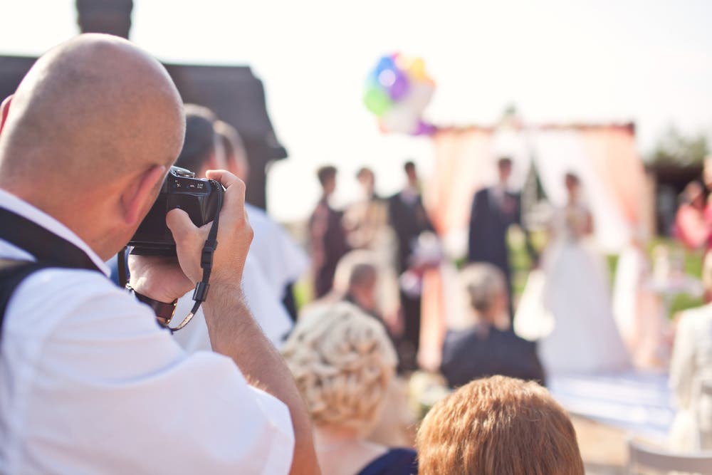 Wedding Photographer Keeping Distance Using Zoom