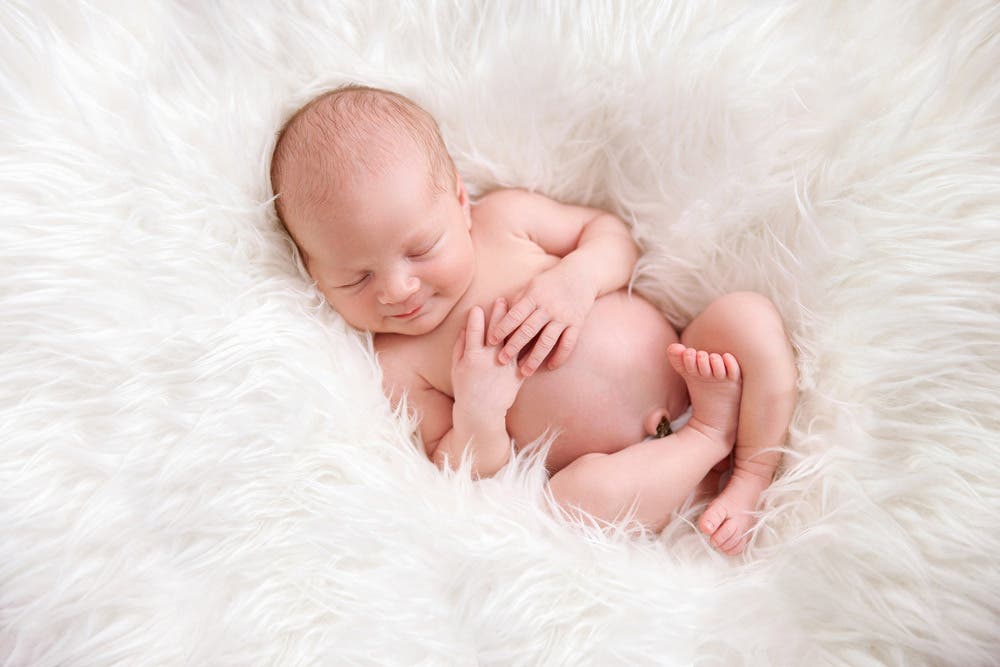 Newborn Baby Photography on Fur Bedding