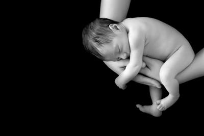 Naked Baby Held Arms