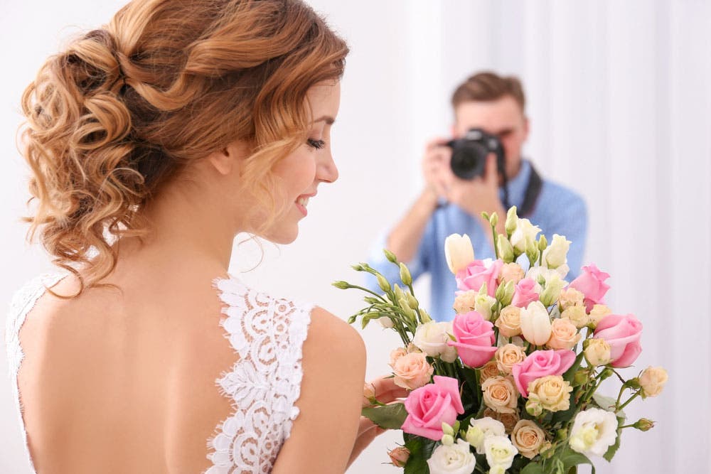 Wedding Photographer Photographing Bride
