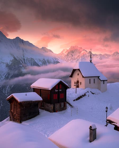 snow covered houses travel photography