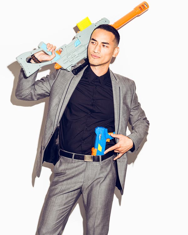 model portrait holding toy gun