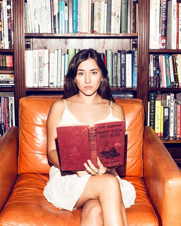 female model sitting in library portrait photography