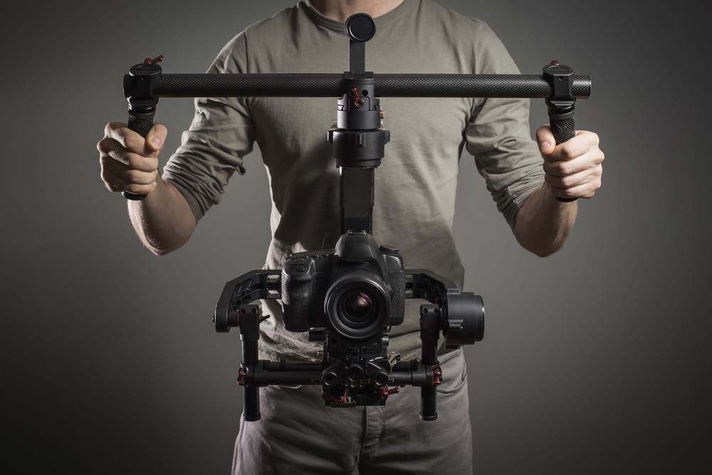 Videographer with Camera Rig
