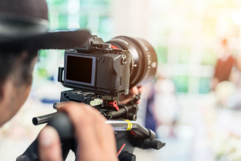 Behind the Scenes Shot of Videographer