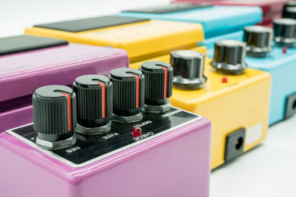 Colorful Guitar Effects Pedals Knobs Shot Up Close