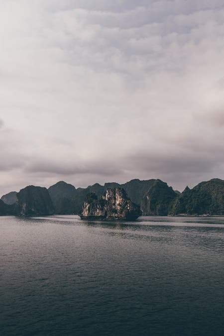 rock formation in water travel photography