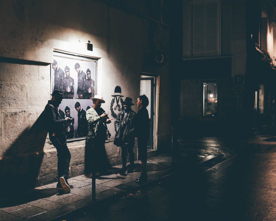 people gathering outside street photography