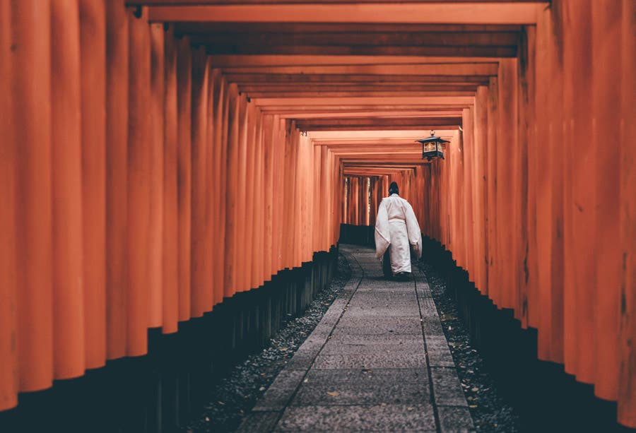 japanese woman walking down path travel photography