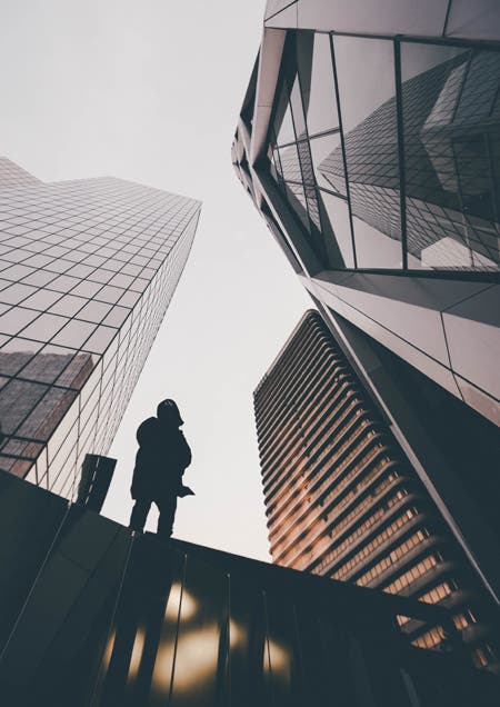 man standing on building travel photography