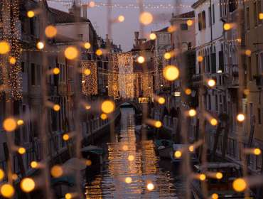 string lights around canal in venice travel photography