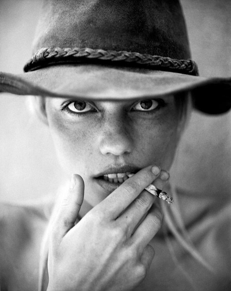 female smoking with black and white portrait