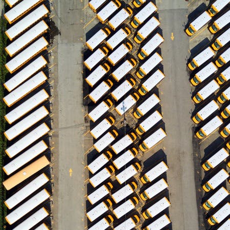 buses in parking lot drone photography