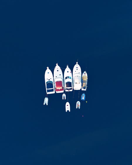 five boats drone photography