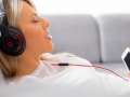 Woman listening to music with Beats headphones