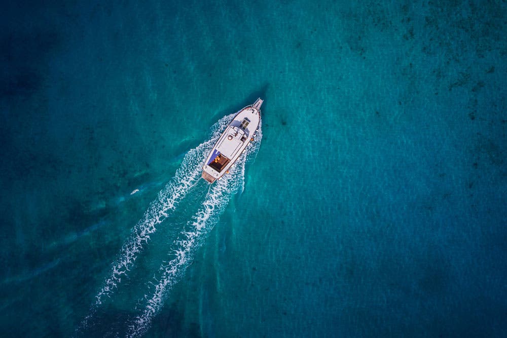 Top view of speedboat on blue waters