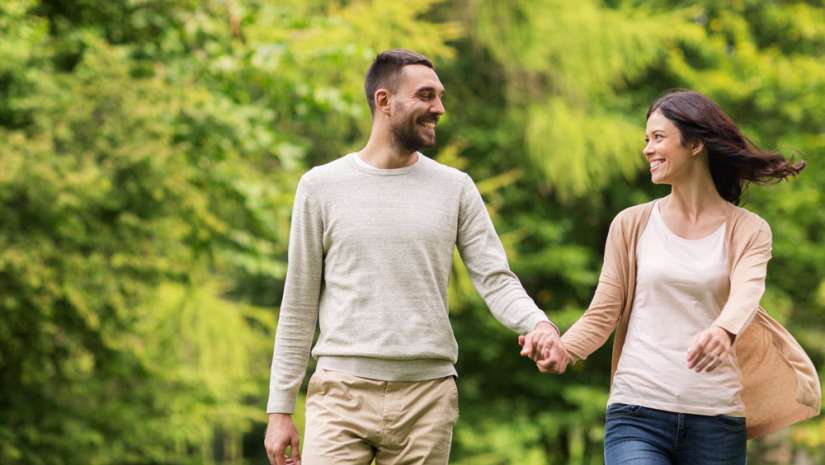 Couple walking hand in hand