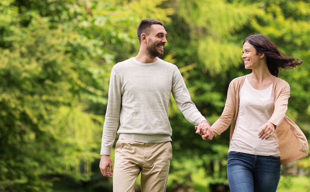 Couple walking hand in hand